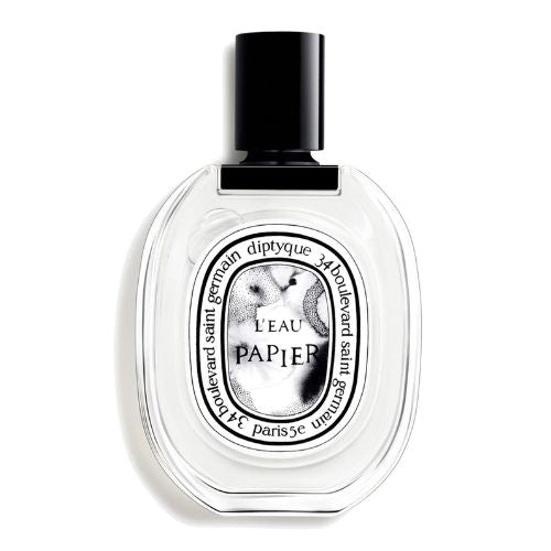 Diptyque L'Eau Papier, 100ml EDT, soft and sophisticated unisex perfume with airy, musky, and floral notes in a transparent oval glass bottle.