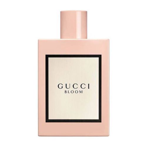 Gucci luxury perfume – Bloom Eau de Parfum 100ml, sophisticated floral fragrance housed in a minimalist white cylindrical glass bottle