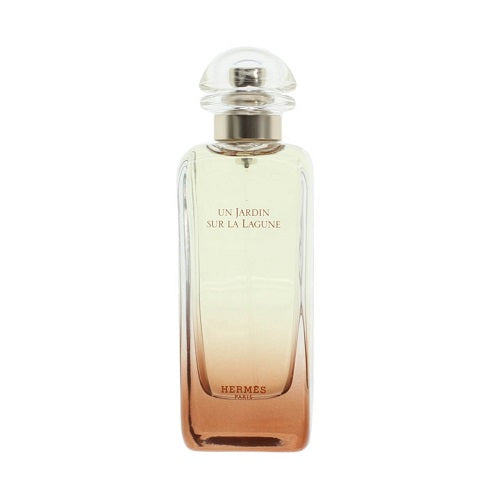 Hermès Un Jardin Sur La Lagune Eau de Toilette 100ml, light floral-citrus fragrance for men and women in a transparent rectangular bottle with subtle silver accents.