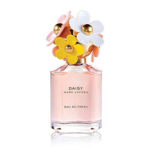 EDT bottle of Marc Jacobs Daisy Eau So Fresh 75 ml, transparent glass with pink liquid, silver spray top, and decorative white daisy petals on the lid.