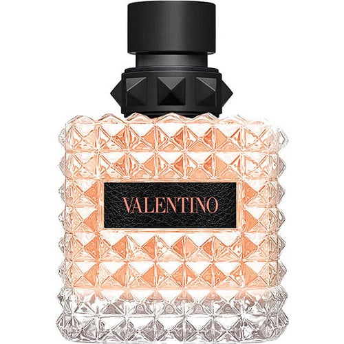 Valentino Donna Born In Roma Coral Fantasy Eau de Parfum 100ml, presented in a vibrant coral-inspired studded bottle with geometric facets and striking black accents, symbolizing a playful yet refined blend of sophistication and youthful femininity.