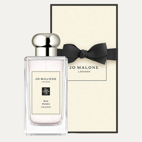 100ml Jo Malone London English Pear & Freesia Cologne, fresh fruity-floral unisex perfume blending pear, freesia, and musky accords in a minimalist clear bottle with silver detailing.