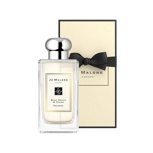 Jo Malone London Blue Agava & Cacao Cologne 100ml, modern unisex scent in a transparent rectangular bottle with silver lid, featuring agave, cacao, and creamy gourmand accords.