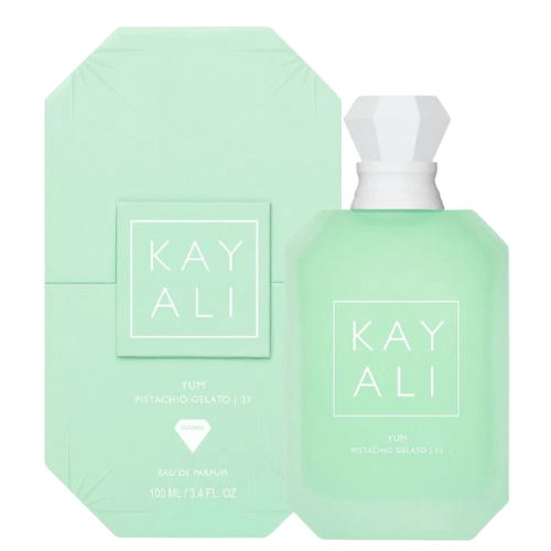 Close-up of Kayali Yum Pistachio Gelato 33 perfume showcasing stylish packaging, sweet gelato, pistachio, and vanilla notes, a cozy feminine scent.