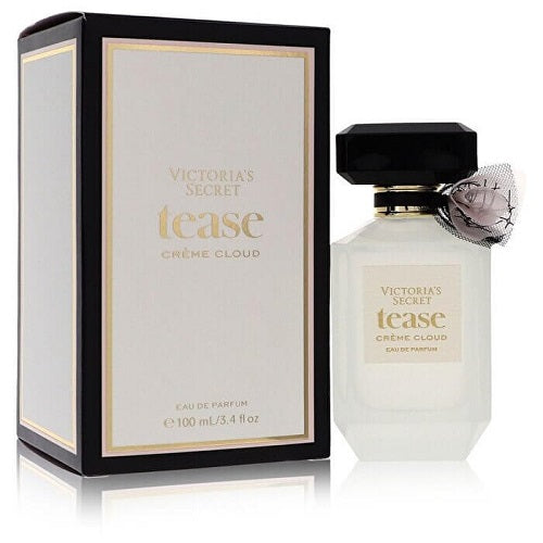 Luxury Victoria’s Secret Tease Crème Cloud Eau de Parfum 100ml, housed in a pastel pink faceted flacon with subtle white detailing and matching spray cap, combining elegance, sweetness, and feminine allure.