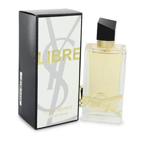 Elegant Yves Saint Laurent Libre Eau de Parfum 90ml, housed in a clear flacon with warm amber liquid, sleek edges, silver YSL detailing, and minimalist spray top, reflecting luxury, bold elegance, and contemporary feminine charm.